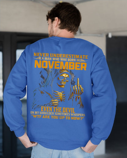 NEVER UNDERESTIMATE A MAN WHO WAS BORN IN NOVEMBER - ntnt11 male (SKU12-276-11)